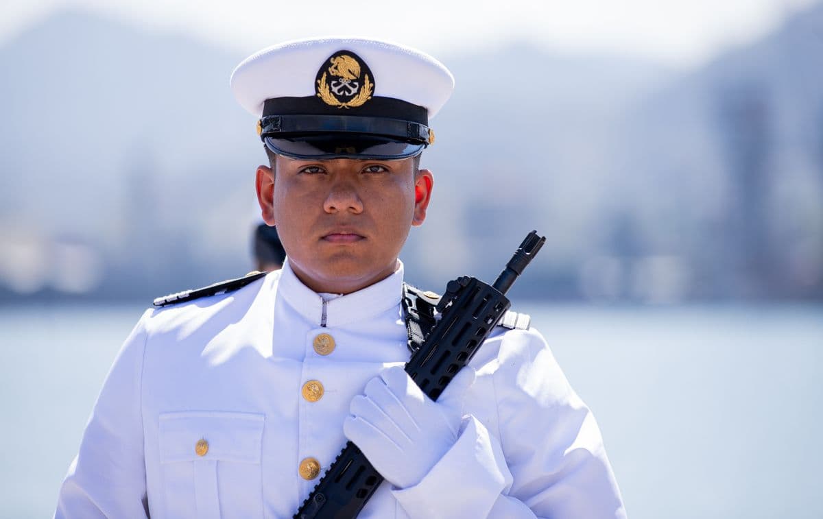 Merchant Navy officer in formal white uniform